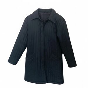 Cleo  petite deep black fall coat with tailored planket and clean, simple lines